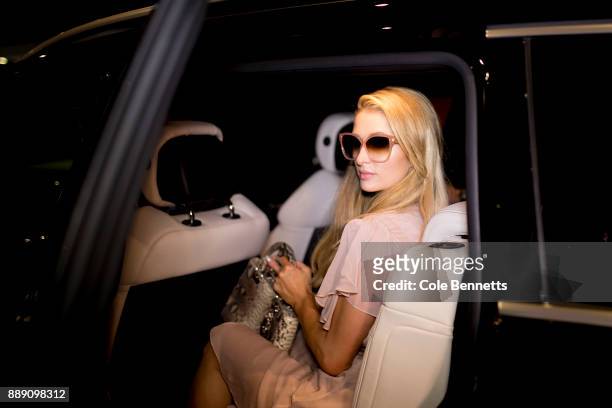 Paris Hilton photographed getting into her car during a promotion visit to Australia to launch her 23rd fragrance, Rosé Rush on November 30, 2017 in...