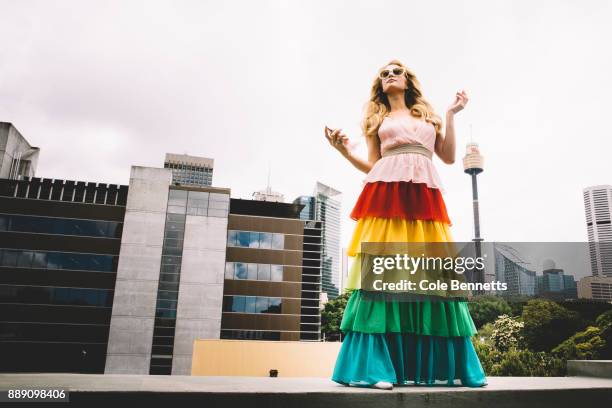 Paris Hilton poses for a photoshoot on the MTV rooftop during a promotion visit to Australia to launch her 23rd fragrance, Rosé Rush on November 29,...