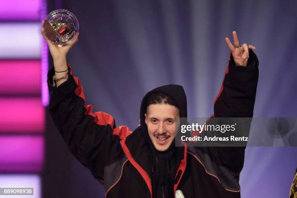 Poses with his award for best album on stage during the 1Live Krone radio award at Jahrhunderthalle on December 07, 2017 in Bochum, Germany.