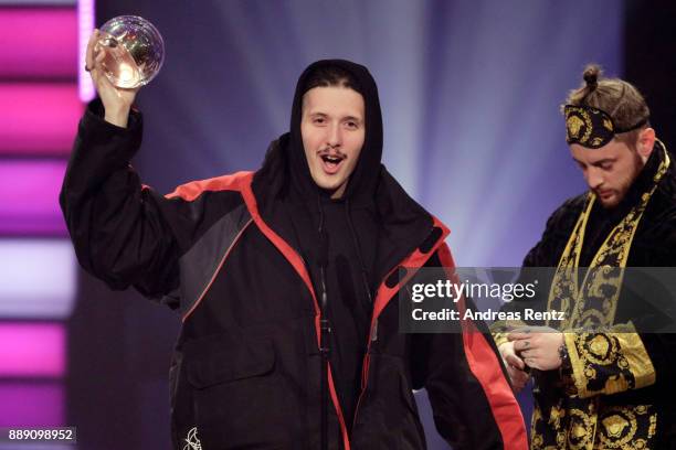 Poses with his award for best album on stage during the 1Live Krone radio award at Jahrhunderthalle on December 07, 2017 in Bochum, Germany.