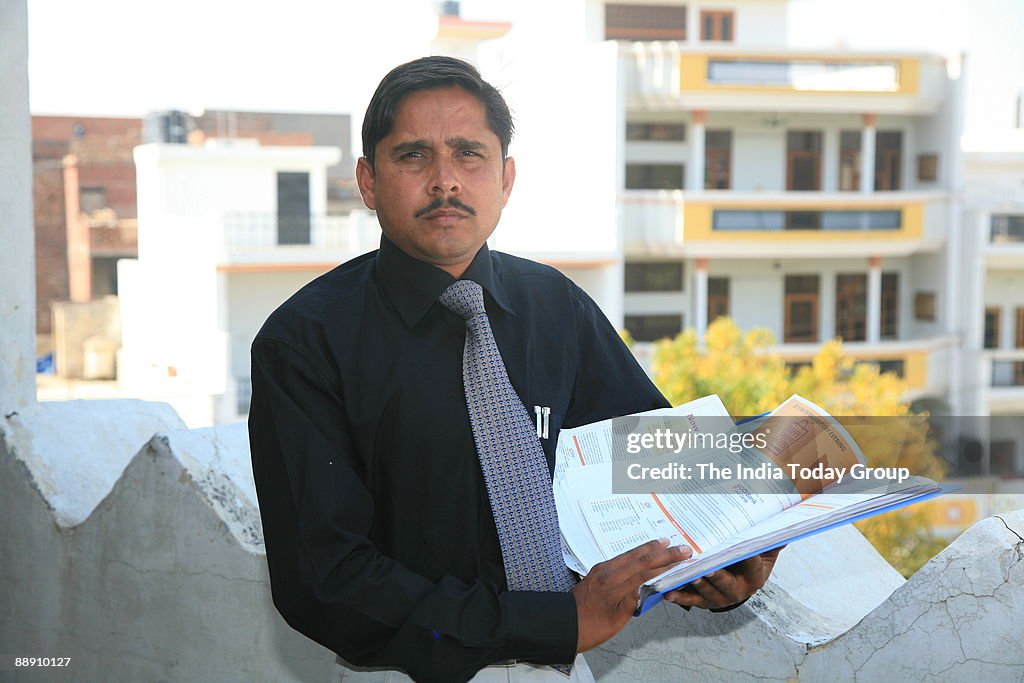 Rajesh Kumar Pathak, whose credit card was misused and swiped for several lakhs of rupees while he was traveling abroad