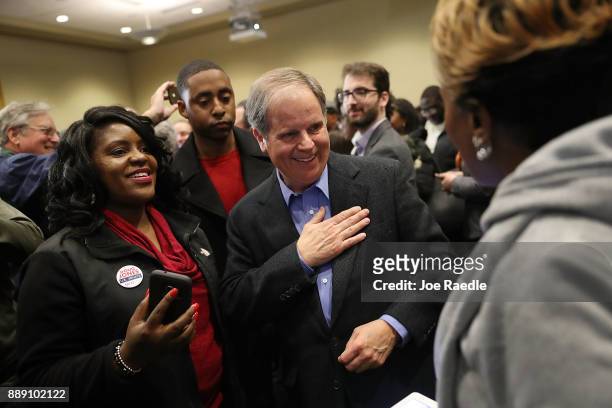 Democratic Senatorial candidate Doug Jones greets people during a campaign event held at Alabama State University at the John Garrick Hardy...