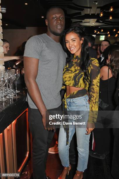 Stormzy and Maya Jama attend Idris Elba's Christmas Party at Kadie's Cocktail Bar & Club on December 9, 2017 in London, England.