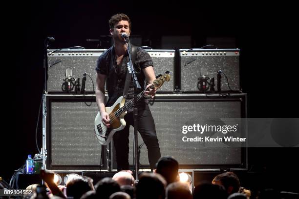 Mike Kerr of Royal Blood performs onstage during KROQ Almost Acoustic Christmas 2017 at The Forum on December 9, 2017 in Inglewood, California.