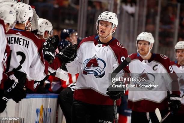 Mikko Rantanen of the Colorado Avalanche celebrates his goal with teammates during the first period against the Florida Panthers at the BB&T Center...