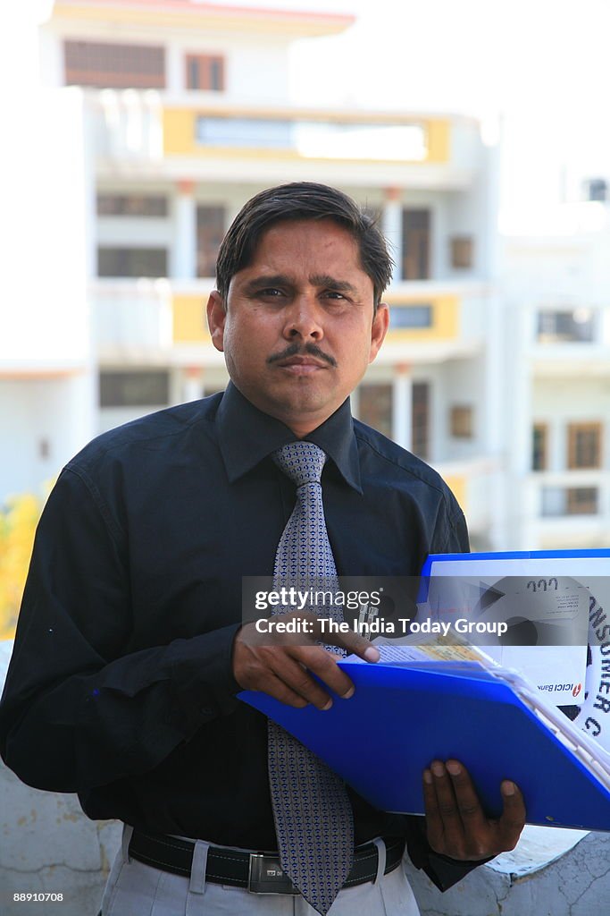 Rajesh Kumar Pathak, whose credit card was misused and swiped for several lakhs of rupees while he was traveling abroad