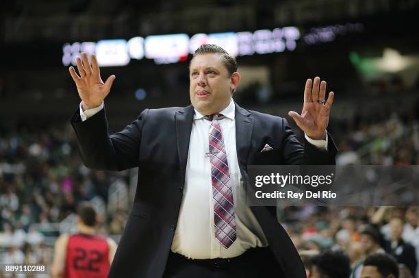 Head coach Todd Simon of the Southern Utah Thunderbirds looks on from the bench against the Michigan State Spartans at Breslin Center on December 9,...