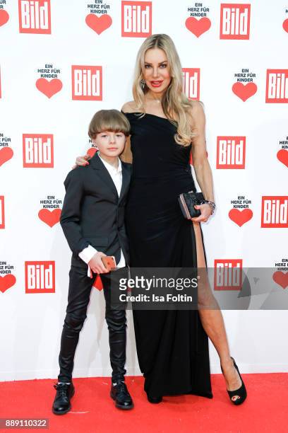 German actress Xenia Seeberg and her son Philip-Elias Martinek attend the 'Ein Herz fuer Kinder Gala' at Studio Berlin Adlershof on December 9, 2017...