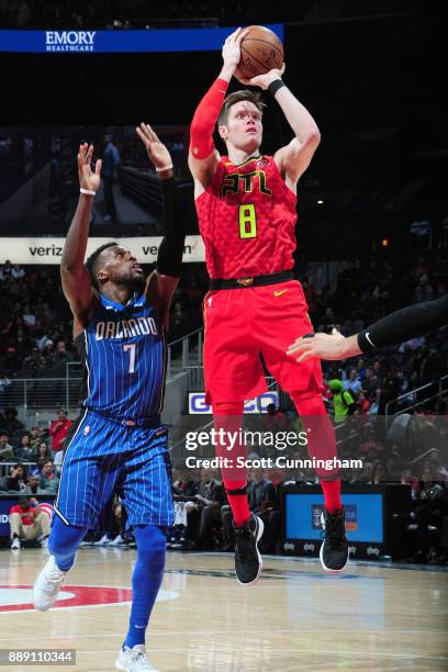 Luke Babbitt of the Atlanta Hawks shoots the ball against the Orlando Magic on December 9, 2017 at Philips Arena in Atlanta, Georgia. NOTE TO USER:...