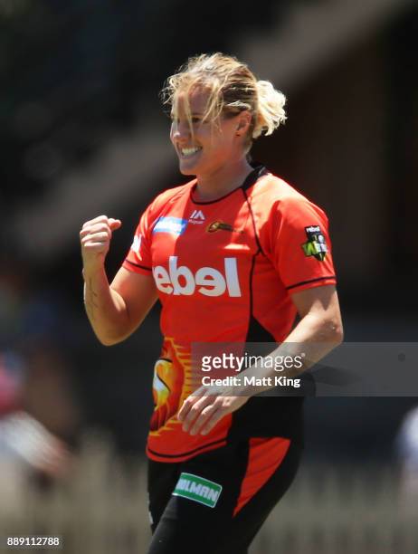 Katherine Brunt of the Scorchers celebrates taking the wicket of Beth Mooney of the Heat during the Women's Big Bash League WBBL match between the...