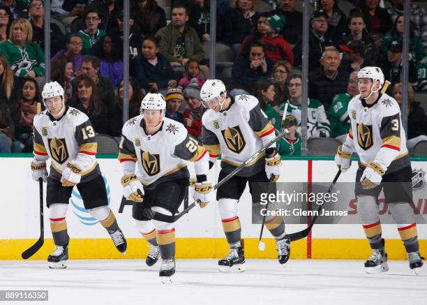 Brendan Leipsic, Cody Eakin, Brayden McNabb and the Vegas Golden Knights celebrate a goal against the Dallas Stars at the American Airlines Center on...