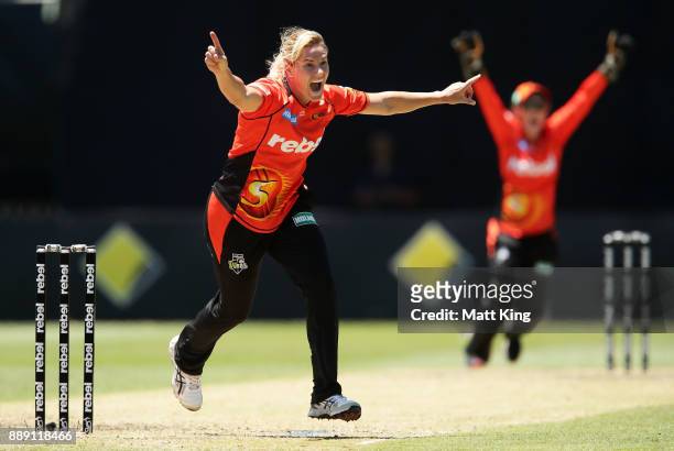 Katherine Brunt of the Scorchers celebrates taking the wicket of Haidee Birkett of the Heat during the Women's Big Bash League WBBL match between the...