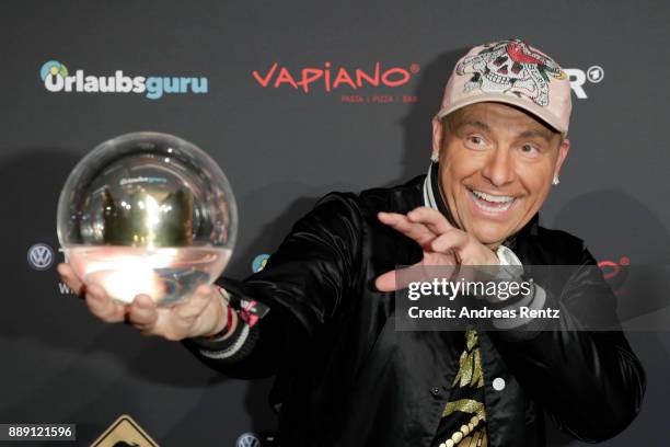 Dennis aus Huerth poses with his award during the 1Live Krone radio award at Jahrhunderthalle on December 07, 2017 in Bochum, Germany.