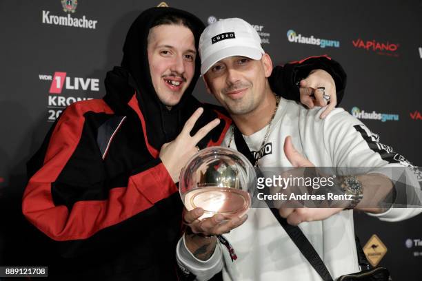And RAF Camora pose during the 1Live Krone radio award at Jahrhunderthalle on December 07, 2017 in Bochum, Germany.