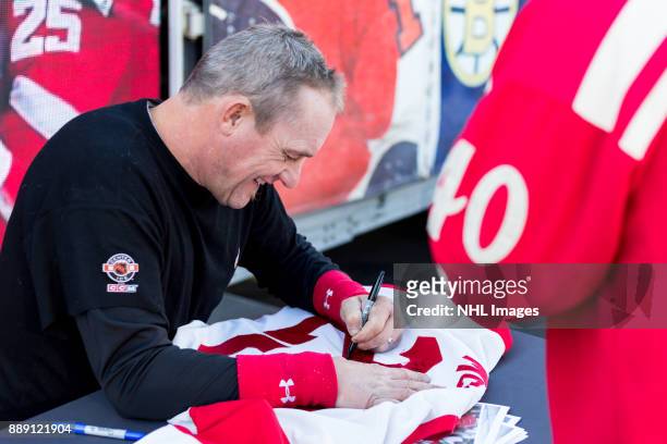 Darren McCarty signs autographs during the NHL Centennial Fan Arena on December 3, 2017 in Detroit, Michigan.