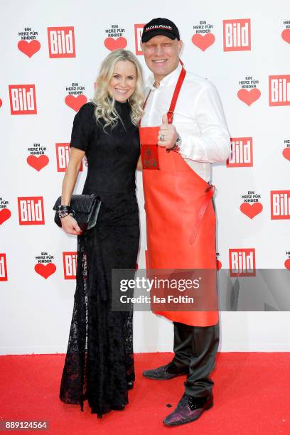 Former boxing champion Axel Schulz and his wife Patricia Schulz attend the 'Ein Herz fuer Kinder Gala' at Studio Berlin Adlershof on December 9, 2017...