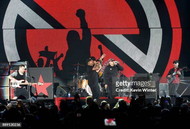 Tim Commerford, Chuck D, B-Real, Brad Wilk, B-Real and Tom Morello of Prophets of Rage perform onstage during KROQ Almost Acoustic Christmas 2017 at...