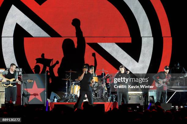 Tim Commerford, Chuck D, B-Real, Brad Wilk, B-Real and Tom Morello of Prophets of Rage perform onstage during KROQ Almost Acoustic Christmas 2017 at...