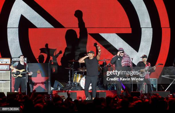 Tim Commerford, Chuck D, B-Real, Brad Wilk, B-Real and Tom Morello of Prophets of Rage perform onstage during KROQ Almost Acoustic Christmas 2017 at...