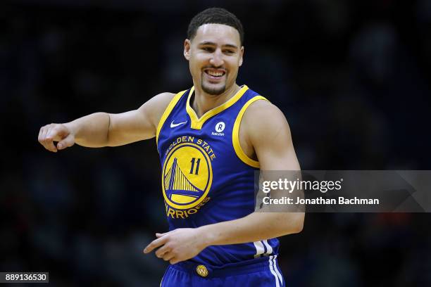 Klay Thompson of the Golden State Warriors reacts during the second half of a game against the New Orleans Pelicans at the Smoothie King Center on...