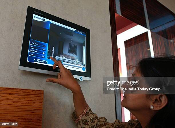 Heena Vora controls her house through touch screen interphase in the Western Indian of City Of Mumbai .The touch screen help to switch on and off...