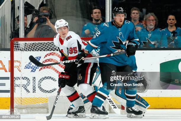 Tim Heed of the San Jose Sharks defends Matt Duchene of the Ottawa Senators at SAP Center on December 9, 2017 in San Jose, California.