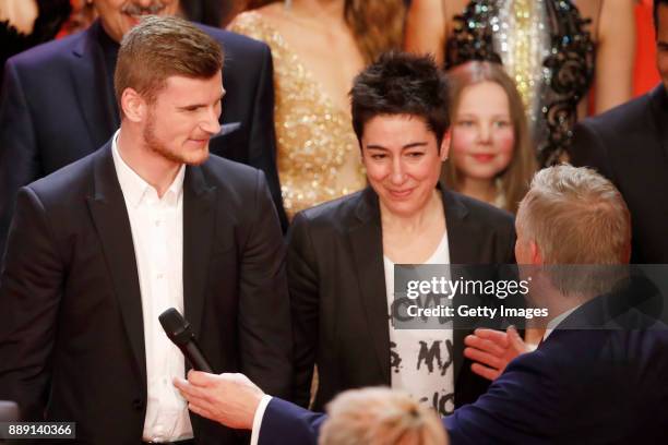 Timo Werner, Dunja Hayali and Johannes B. Kerner during the Ein Herz Fuer Kinder Gala show at Studio Berlin Adlershof on December 9, 2017 in Berlin,...