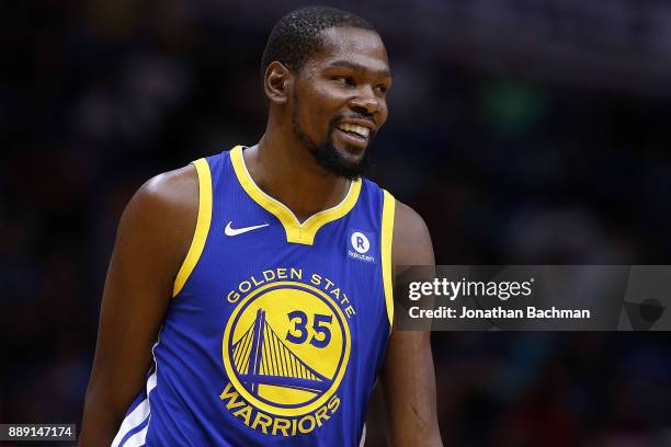 Kevin Durant of the Golden State Warriors reacts during a game against the New Orleans Pelicans at the Smoothie King Center on December 4, 2017 in...