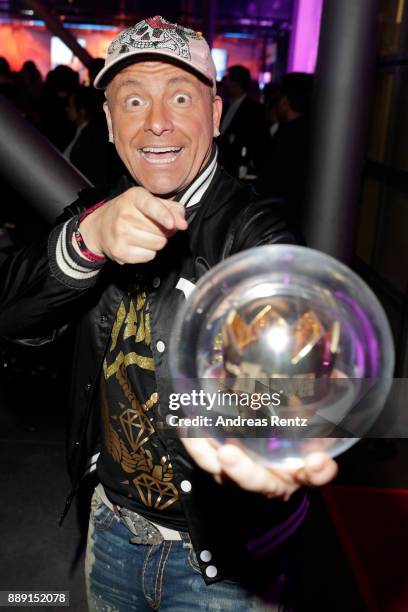 Dennis aus Huerth poses with his award at the after party of the 1Live Krone radio award at Jahrhunderthalle on December 07, 2017 in Bochum, Germany.