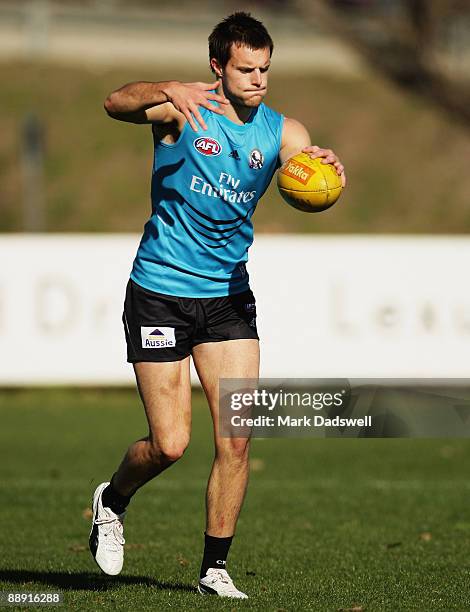 Nathan Brown of the Magpies kicks for goal during a Collingwood Magpies AFL training session held at Gosch's Paddock on July 9, 2009 in Melbourne,...