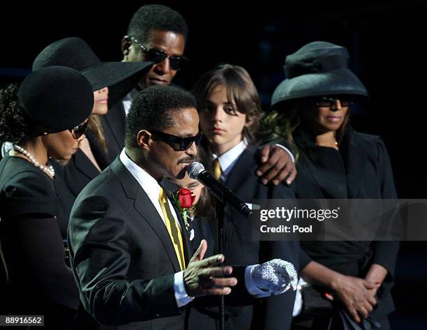 Janet Jackson, La Toya Jackson, Jackie Jackson, Michael Jackson's son Prince Michael Jackson and Rebbie Jackson look on as Marlon Jackson speaks...