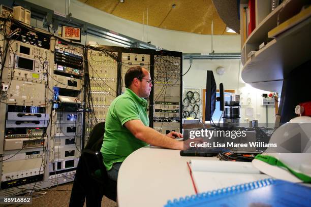 An Operations Scientist works in the control room of The Australian Commonwealth Scientific and Industrial Research Organisation's Australia...