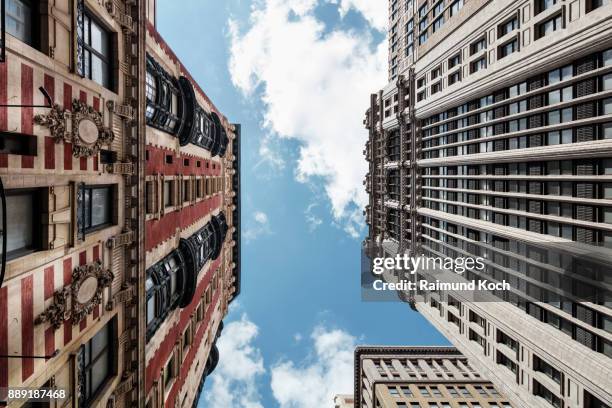 looking up at buildings on madison avenue in manhattan - madison avenue bildbanksfoton och bilder
