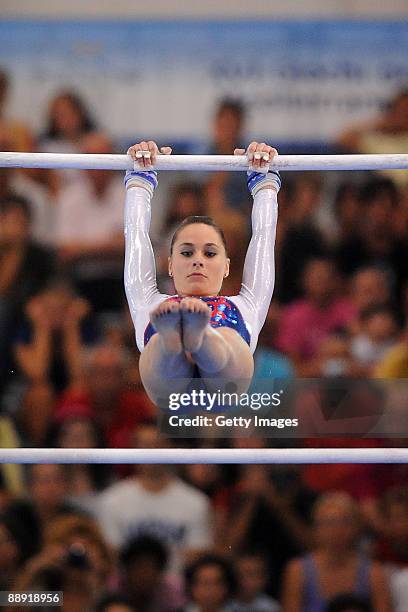 Pauline Morel of France competes in women's Uneven Bars gold medal final event during XVI Mediterranean Games at Pala Universo on July 2, 2009 in...