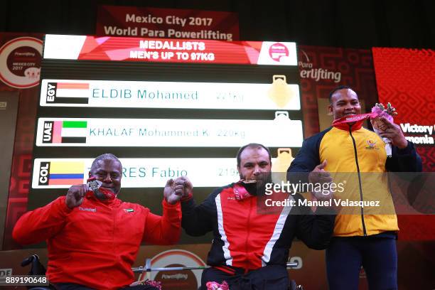 Second Place, Mohammed Khalaf of the United Arab Emirates, First Place, Mohamed Eldib of Egypt and Fabio Torres of Colombia poses with their medals...