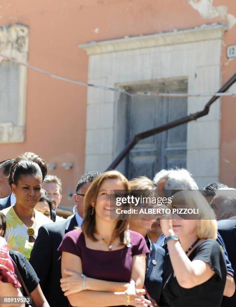 First ladies from the US, Michelle Obama , and from Mexico, Margarita Zavala , visit an earthquake affected area in L'Aquila, in central Italy,...