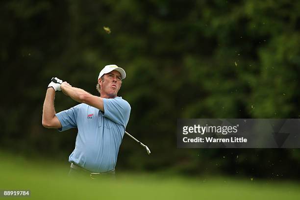 Richard Green of Australia hits an approach shot during the First Round of The Barclays Scottish Open at Loch Lomond Golf Club on July 09, 2009 in...