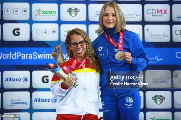 Meri Makkinen of Finland Gold Medal and Juri Marichal Silver medal of Spain celebrates in women's 200 m Freestyle SM7 during day 7 of the Para...