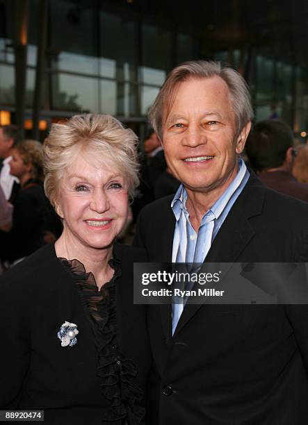 Actor Michael York and wife Patricia McCallum pose during the arrivals for the opening night performance of "Monty Python's Spamalot" at the Center...