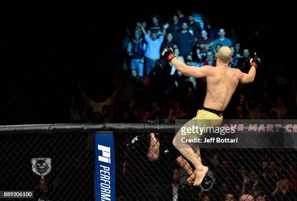 Marlon Moraes of Brazil celebrates his knockout victory over Aljamain Sterling in their bantamweight bout during the UFC Fight Night event inside...