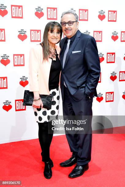 German Actor Wolfgang Stumph and his wife Christine Stumph attend the 'Ein Herz fuer Kinder Gala' at Studio Berlin Adlershof on December 9, 2017 in...