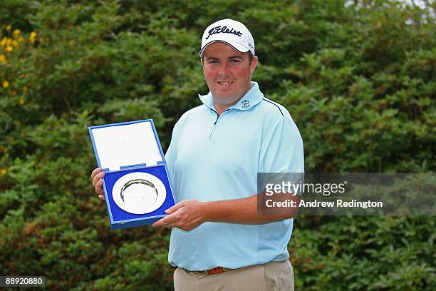 Shane Lowry of Ireland receives his European Tour Golfer of the Month award for May during the First Round of The Barclays Scottish Open at Loch...
