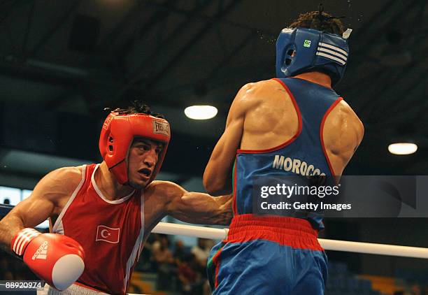 Onder Sipal of Turkey fights Mehdi Khalsi of Morocco during the Men's Welter 69kg final on day 6 during the XVI Mediterranean Games at the Sports...