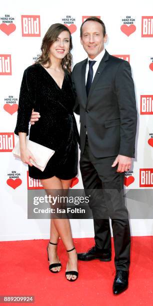 German Actor Wotan Wilke Moehring and his partner Cosima Lohse attend the 'Ein Herz fuer Kinder Gala' at Studio Berlin Adlershof on December 9, 2017...