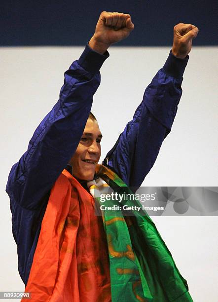 Gold medalist Domenico Valentino of Italy celebrates the victory on the podium during the medal ceremony Men's Light 60kg final on day 6 during the...