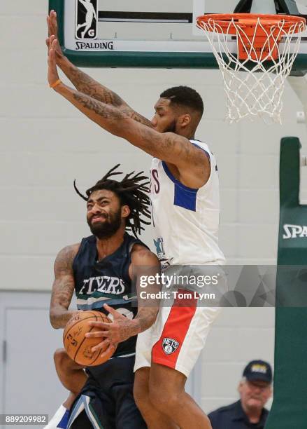 James Young of the Wisconsin Herd goes for a lay up against the Long Island Nets on December 9, 2017 at the Menominee Nation Arena in Oshkosh,...