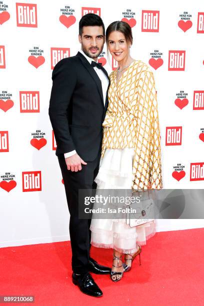 German Actress Wolke Hegenbarth and her partner Oliver Vaid attend the 'Ein Herz fuer Kinder Gala' at Studio Berlin Adlershof on December 9, 2017 in...