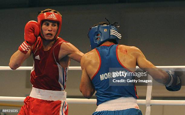 Alexis Vastine of France fights Driss Moussaid of Morocco during the Men's Light Welter 64kg final on day 6 during the XVI Mediterranean Games at the...