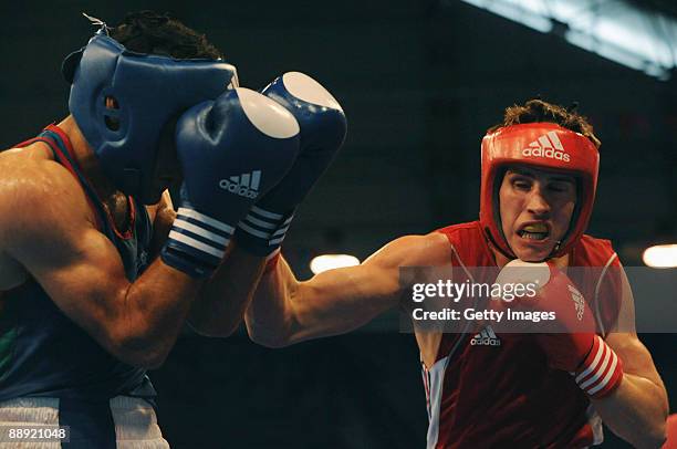 Alexis Vastine of France fights Driss Moussaid of Morocco during the Men's Light Welter 64kg final on day 6 during the XVI Mediterranean Games at the...