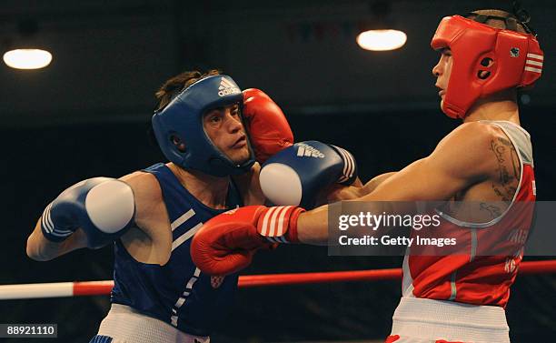 Domenico Valentino of Italy fights Filip Palic of Croatia during the Men's Light 60kg final on day 6 during the XVI Mediterranean Games at the Sports...